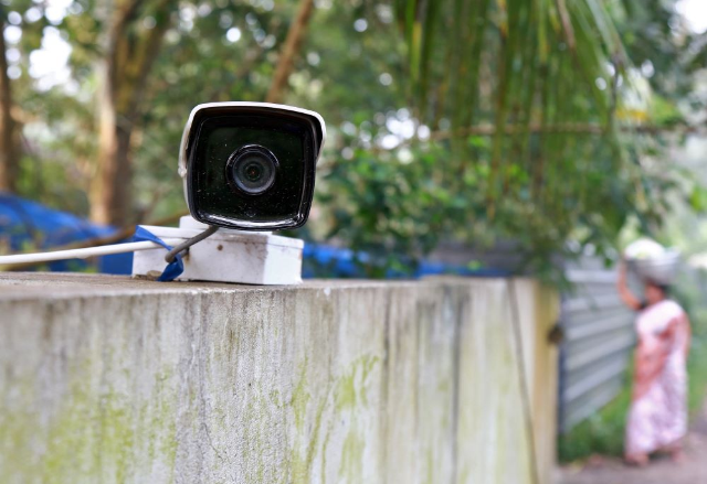 A CCTV camera, installed on the boundary wall of a house is pictured at Vaikom in the Kottayam district of the southern state of Kerala, India November 23, 2017